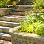 natural stone hardscape w/ landscape